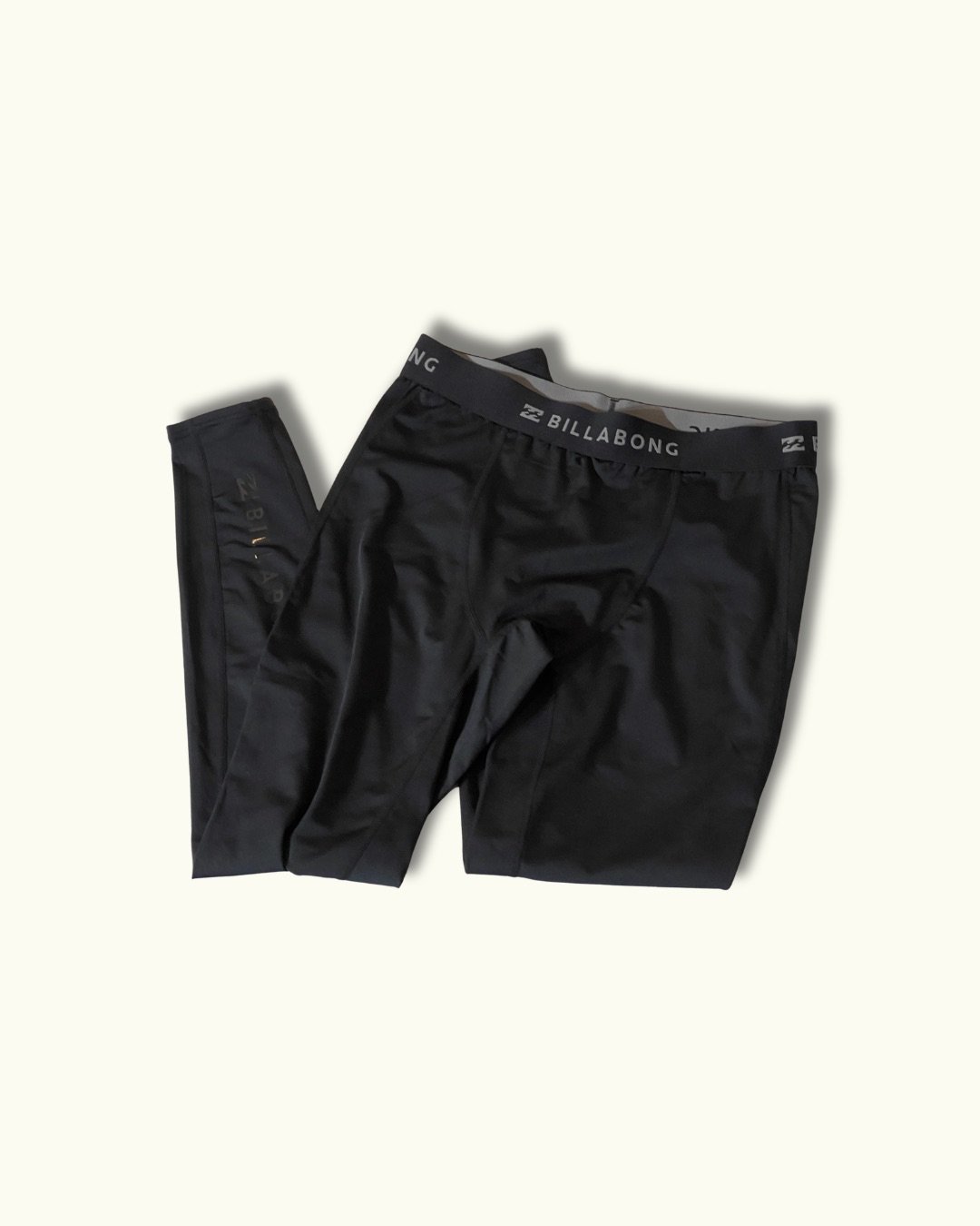 BILLABONGのメンズ用ブラックのラッシュレギンス